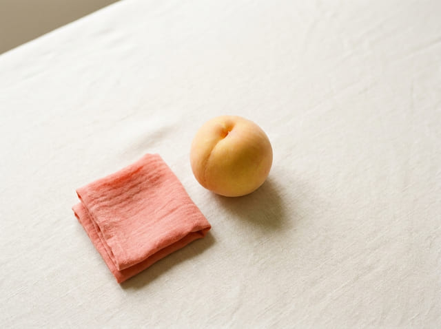 A peach, the size of a baby at week 14