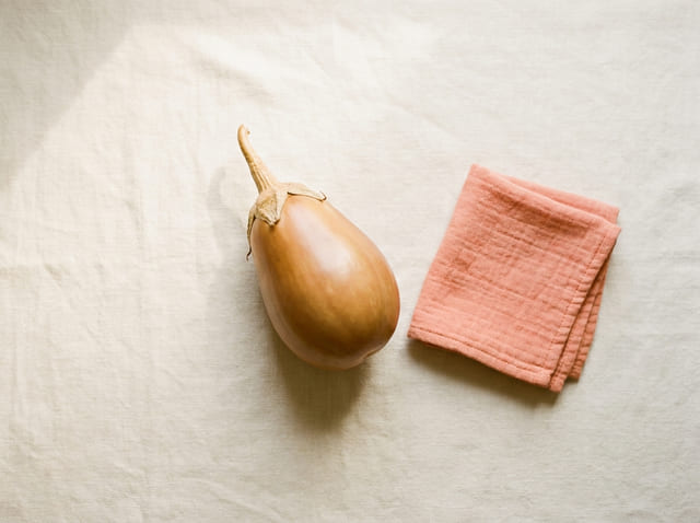 A eggplant, the size of a baby at week 28