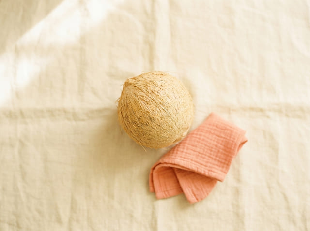 A coconut, the size of a baby at week 31