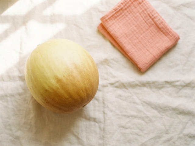 A honeydew melon, the size of a baby at week 35
