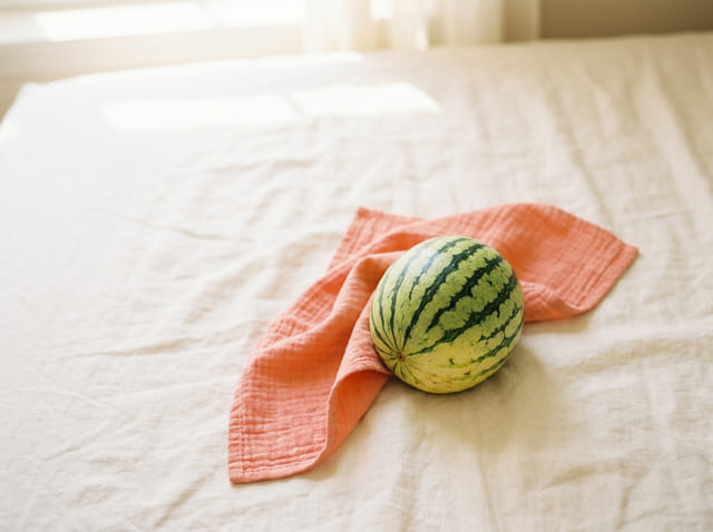 A mini watermelon, the size of a baby at week 39